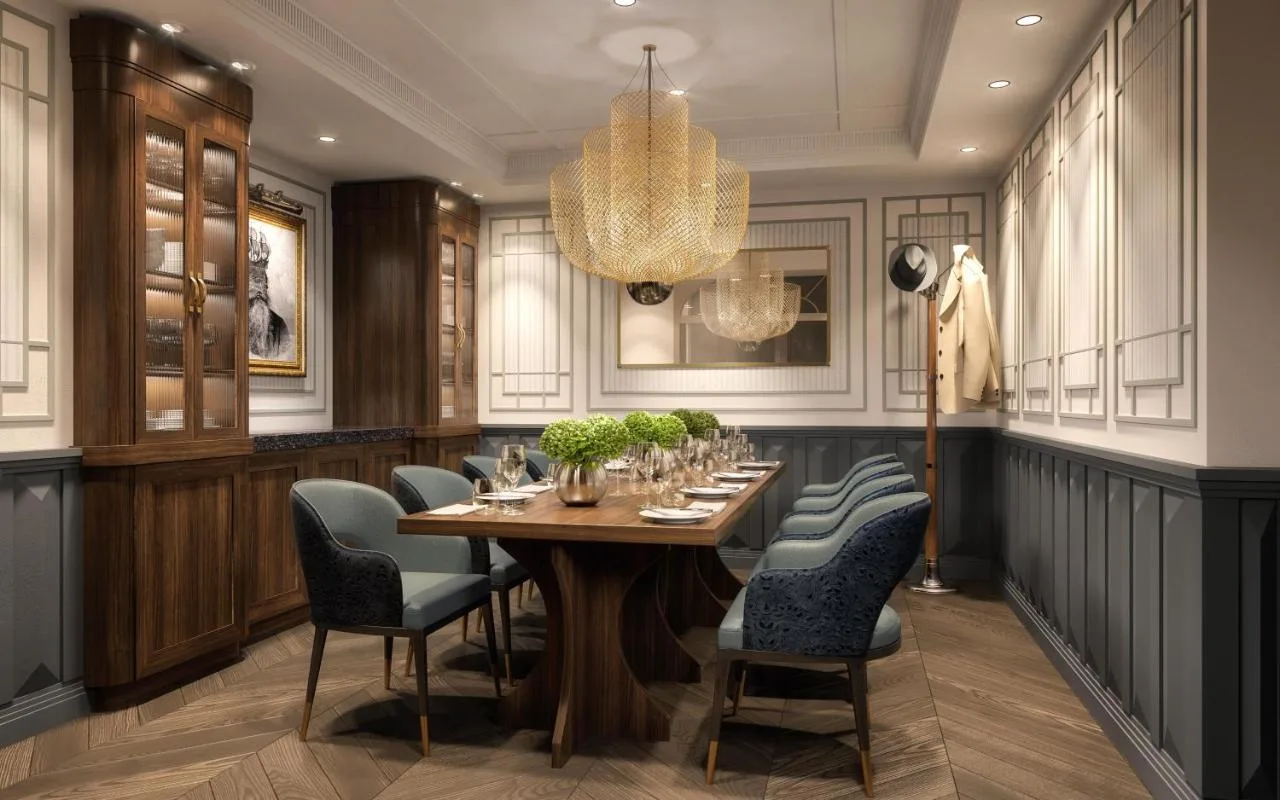 A dining room with a table and chairs at The Mayfair Townhouse in London